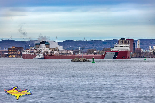 Great Lakes Freighters Roger Blough taking on supplies from the Supply Boat Ojibway