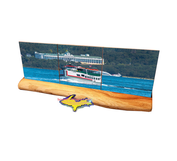 A panoramic view of the Grand Hotel and Mackinac Ferry on three ceramic tile coasters making a unique Michigan Made gift