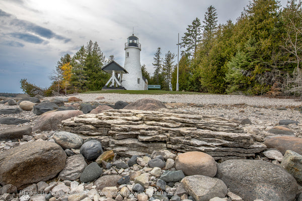 Old Presque Isle Lighthouse along Lake Huron shorelines in Presque Isle, Michigan
